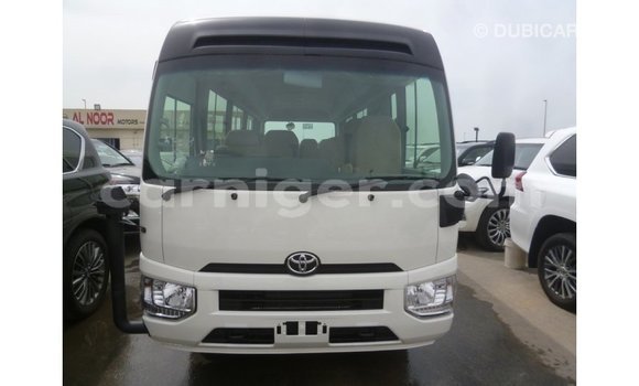 Sayi Imported Toyota Coaster White Mota in Import - Dubai a Agadez Sayi Imported Toyota Coaster White Mota in Import - Dubai a Agadez