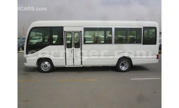 Sayi Imported Toyota Coaster White Mota in Import - Dubai a Agadez Sayi Imported Toyota Coaster White Mota in Import - Dubai a Agadez