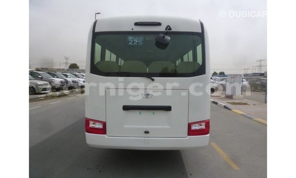 Sayi Imported Toyota Coaster White Mota in Import - Dubai a Agadez Sayi Imported Toyota Coaster White Mota in Import - Dubai a Agadez