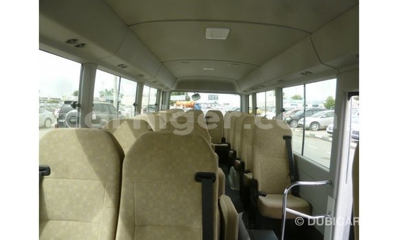 Sayi Imported Toyota Coaster White Mota in Import - Dubai a Agadez Sayi Imported Toyota Coaster White Mota in Import - Dubai a Agadez