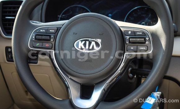 Sayi Imported Kia Sportage Red Mota in Import - Dubai a Agadez Sayi Imported Kia Sportage Red Mota in Import - Dubai a Agadez