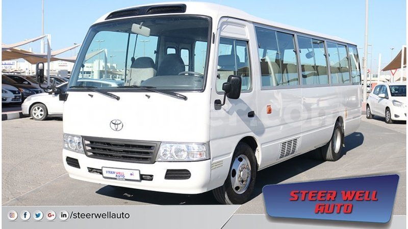 Big with watermark toyota coaster agadez import dubai 5348