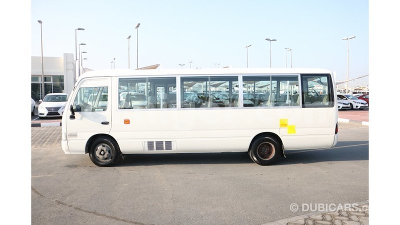 Big with watermark toyota coaster agadez import dubai 5350