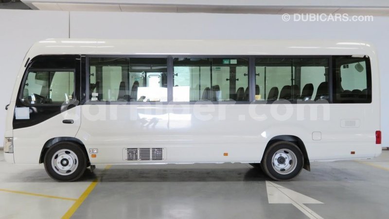 Big with watermark toyota coaster agadez import dubai 5376