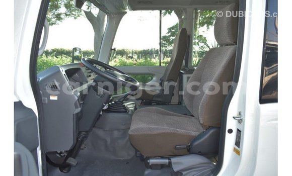 Sayi Imported Toyota Coaster White Mota in Import - Dubai a Agadez Sayi Imported Toyota Coaster White Mota in Import - Dubai a Agadez
