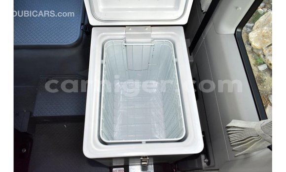 Sayi Imported Toyota Coaster White Mota in Import - Dubai a Agadez Sayi Imported Toyota Coaster White Mota in Import - Dubai a Agadez