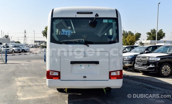 Sayi Imported Toyota Coaster White Mota in Import - Dubai a Agadez Sayi Imported Toyota Coaster White Mota in Import - Dubai a Agadez