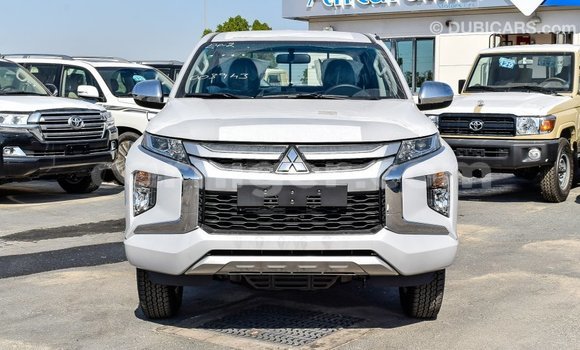 Sayi Imported Mitsubishi L200 White Mota in Import - Dubai a Agadez Sayi Imported Mitsubishi L200 White Mota in Import - Dubai a Agadez