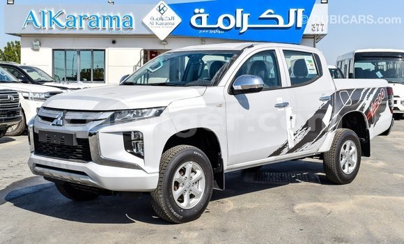 Sayi Imported Mitsubishi L200 White Mota in Import - Dubai a Agadez Sayi Imported Mitsubishi L200 White Mota in Import - Dubai a Agadez