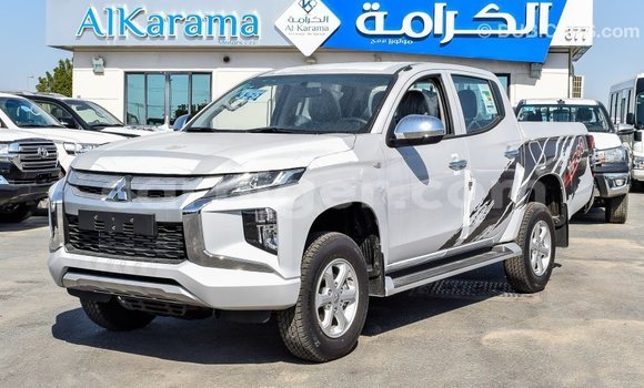 Sayi Imported Mitsubishi L200 White Mota in Import - Dubai a Agadez Sayi Imported Mitsubishi L200 White Mota in Import - Dubai a Agadez
