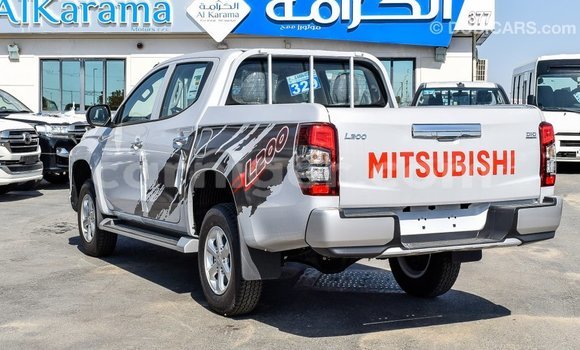 Sayi Imported Mitsubishi L200 White Mota in Import - Dubai a Agadez Sayi Imported Mitsubishi L200 White Mota in Import - Dubai a Agadez