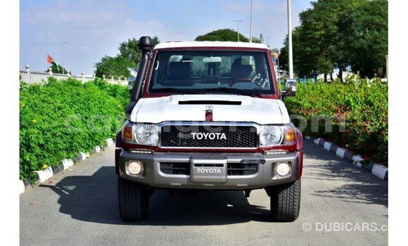 Sayi Imported Toyota Land Cruiser Red Babbar mota in Import - Dubai a Agadez Sayi Imported Toyota Land Cruiser Red Babbar mota in Import - Dubai a Agadez