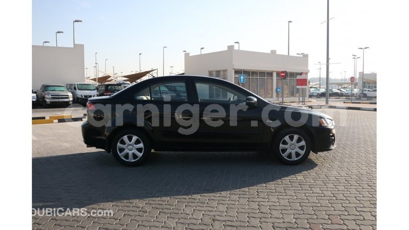 Big with watermark mitsubishi lancer agadez import dubai 5626