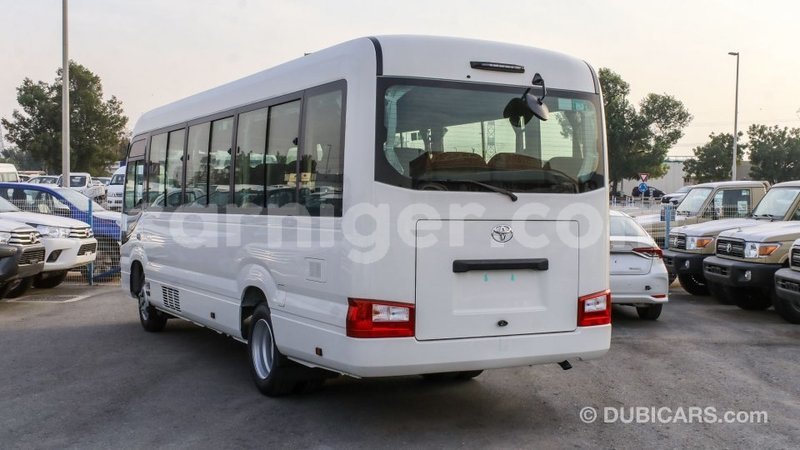 Big with watermark toyota coaster agadez import dubai 5641