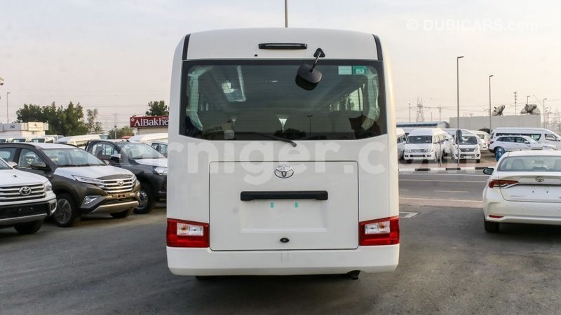 Big with watermark toyota coaster agadez import dubai 5641