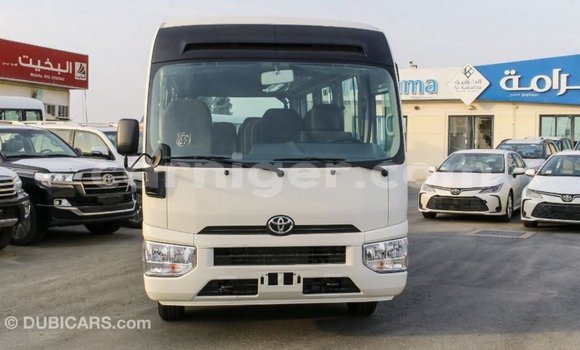 Sayi Imported Toyota Coaster White Mota in Import - Dubai a Agadez Sayi Imported Toyota Coaster White Mota in Import - Dubai a Agadez
