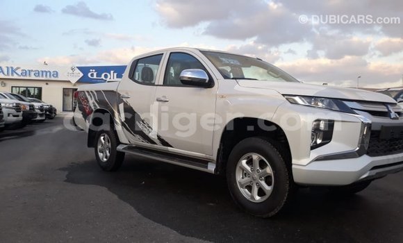 Buy Import Mitsubishi L200 White Car in Import - Dubai in Agadez Buy Import Mitsubishi L200 White Car in Import - Dubai in Agadez