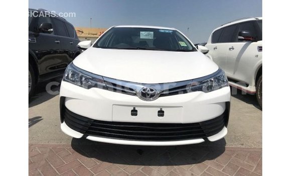 Sayi Imported Toyota Corolla White Mota in Import - Dubai a Agadez Sayi Imported Toyota Corolla White Mota in Import - Dubai a Agadez