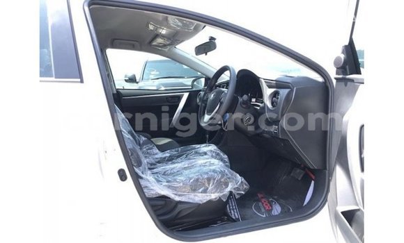 Sayi Imported Toyota Corolla White Mota in Import - Dubai a Agadez Sayi Imported Toyota Corolla White Mota in Import - Dubai a Agadez