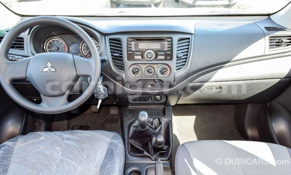 Sayi Imported Mitsubishi L200 White Mota in Import - Dubai a Agadez Sayi Imported Mitsubishi L200 White Mota in Import - Dubai a Agadez