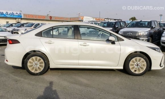 Sayi Imported Toyota Corolla White Mota in Import - Dubai a Agadez Sayi Imported Toyota Corolla White Mota in Import - Dubai a Agadez
