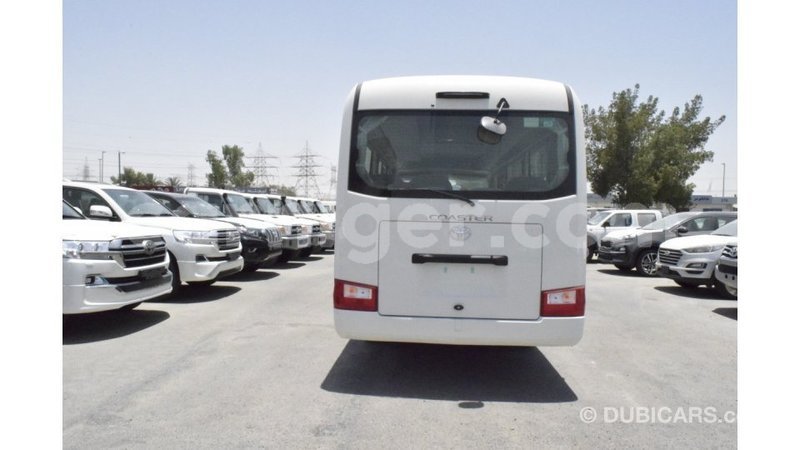 Big with watermark toyota coaster agadez import dubai 6237