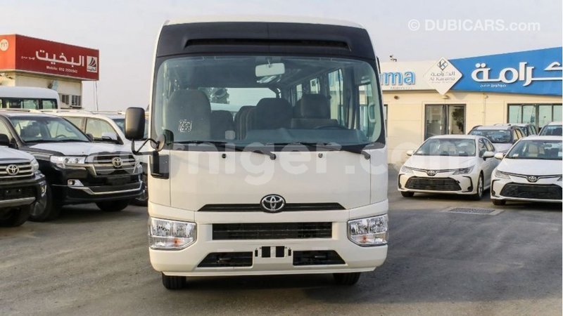 Big with watermark toyota coaster agadez import dubai 6356