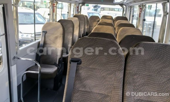 Sayi Imported Toyota Coaster White Mota in Import - Dubai a Agadez Sayi Imported Toyota Coaster White Mota in Import - Dubai a Agadez