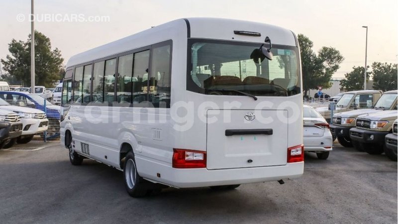 Big with watermark toyota coaster agadez import dubai 6356