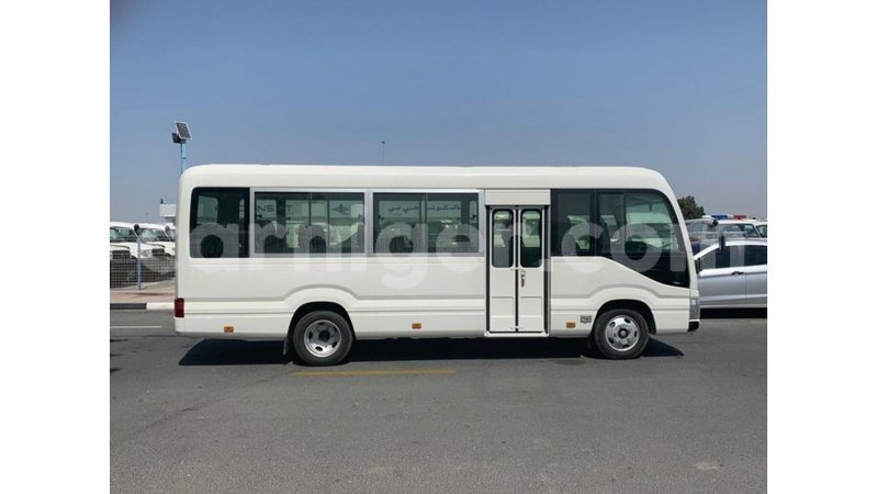 Big with watermark toyota coaster agadez import dubai 6443