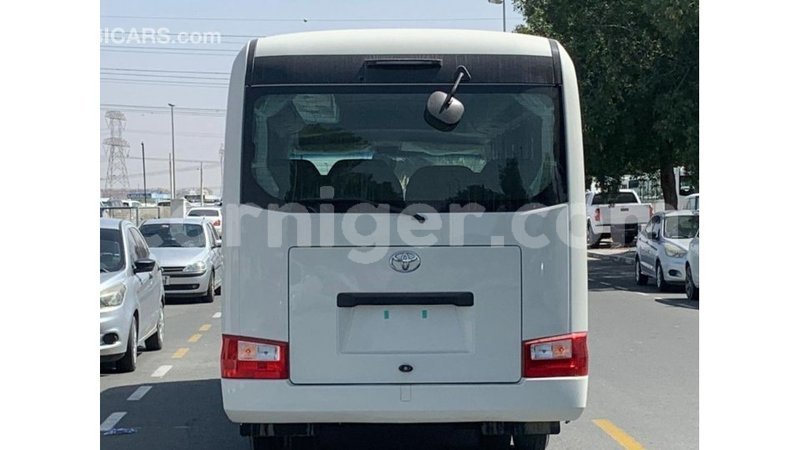 Big with watermark toyota coaster agadez import dubai 6444