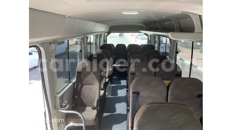 Big with watermark toyota coaster agadez import dubai 6444