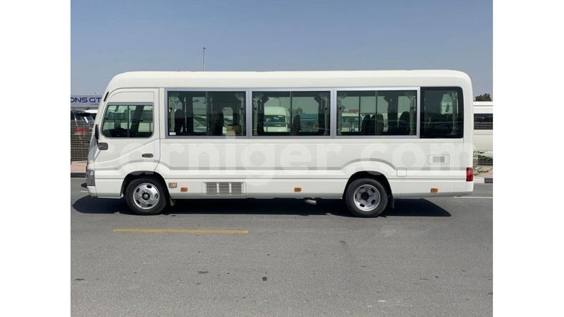 Big with watermark toyota coaster agadez import dubai 6445