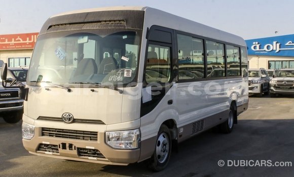 Sayi Imported Toyota Coaster White Mota in Import - Dubai a Agadez Sayi Imported Toyota Coaster White Mota in Import - Dubai a Agadez