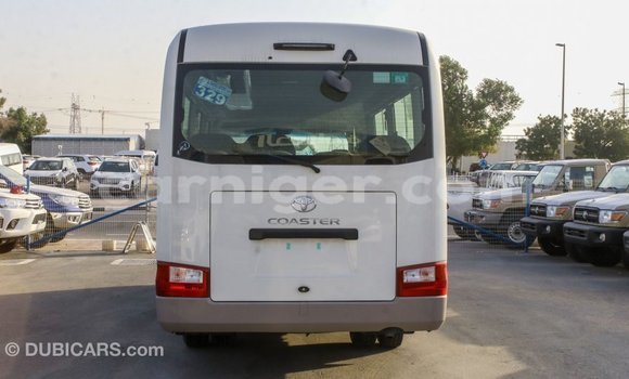 Sayi Imported Toyota Coaster White Mota in Import - Dubai a Agadez Sayi Imported Toyota Coaster White Mota in Import - Dubai a Agadez