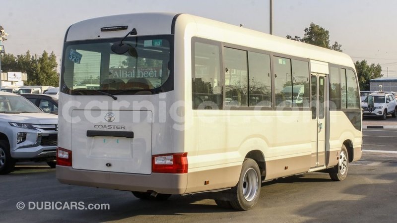 Big with watermark toyota coaster agadez import dubai 6468