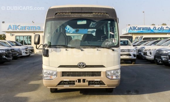 Sayi Imported Toyota Coaster White Mota in Import - Dubai a Agadez Sayi Imported Toyota Coaster White Mota in Import - Dubai a Agadez
