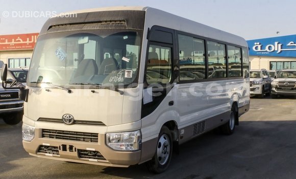 Sayi Imported Toyota Coaster White Mota in Import - Dubai a Agadez Sayi Imported Toyota Coaster White Mota in Import - Dubai a Agadez