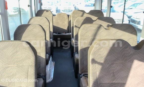 Sayi Imported Toyota Coaster White Mota in Import - Dubai a Agadez Sayi Imported Toyota Coaster White Mota in Import - Dubai a Agadez