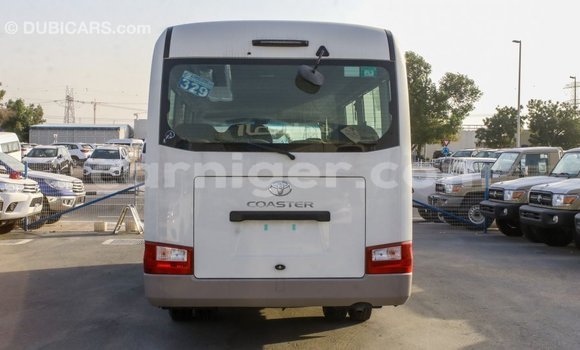 Sayi Imported Toyota Coaster White Mota in Import - Dubai a Agadez Sayi Imported Toyota Coaster White Mota in Import - Dubai a Agadez