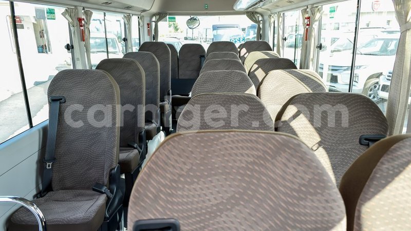 Big with watermark toyota coaster agadez import dubai 6691