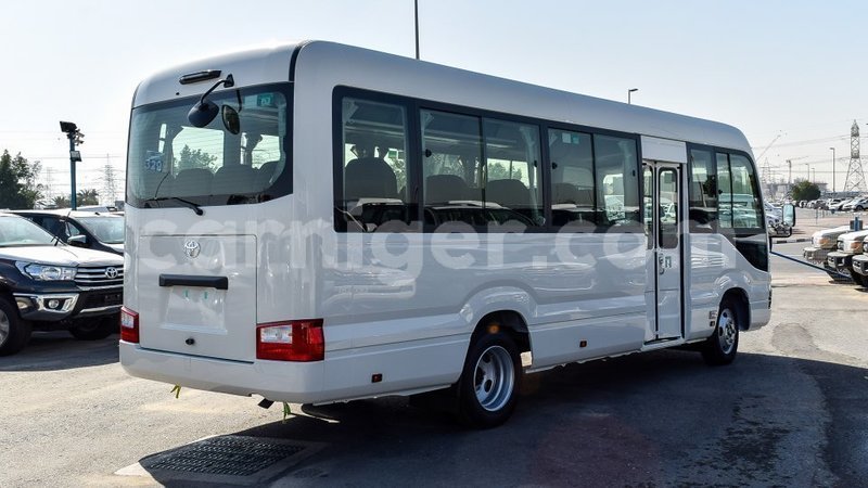 Big with watermark toyota coaster agadez import dubai 6691