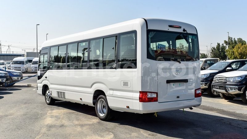 Big with watermark toyota coaster agadez import dubai 6691