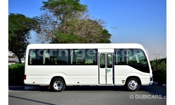 Sayi Imported Toyota Coaster White Mota in Import - Dubai a Agadez Sayi Imported Toyota Coaster White Mota in Import - Dubai a Agadez