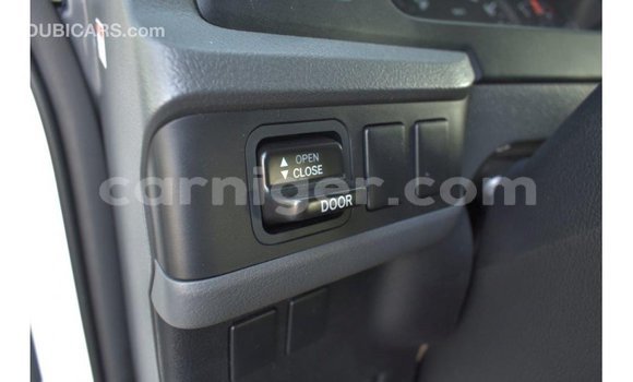 Sayi Imported Toyota Coaster White Mota in Import - Dubai a Agadez Sayi Imported Toyota Coaster White Mota in Import - Dubai a Agadez