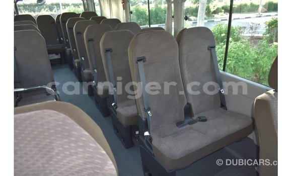 Sayi Imported Toyota Coaster White Mota in Import - Dubai a Agadez Sayi Imported Toyota Coaster White Mota in Import - Dubai a Agadez