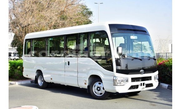 Sayi Imported Toyota Coaster White Mota in Import - Dubai a Agadez Sayi Imported Toyota Coaster White Mota in Import - Dubai a Agadez