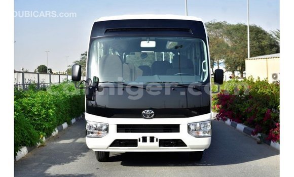 Sayi Imported Toyota Coaster White Mota in Import - Dubai a Agadez Sayi Imported Toyota Coaster White Mota in Import - Dubai a Agadez