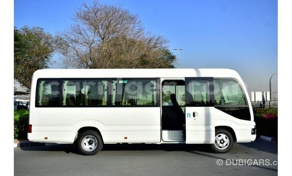 Sayi Imported Toyota Coaster White Mota in Import - Dubai a Agadez Sayi Imported Toyota Coaster White Mota in Import - Dubai a Agadez
