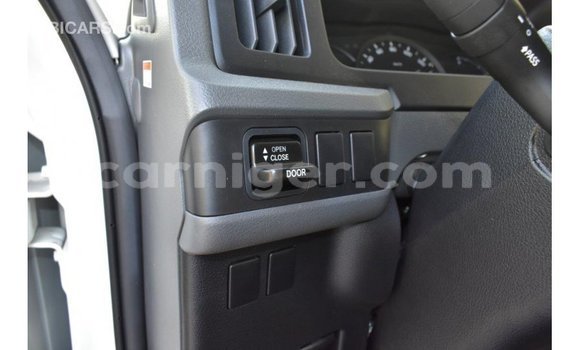 Sayi Imported Toyota Coaster White Mota in Import - Dubai a Agadez Sayi Imported Toyota Coaster White Mota in Import - Dubai a Agadez